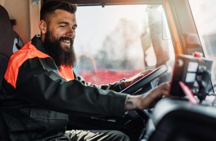 south texas dumpster employee driving a truck