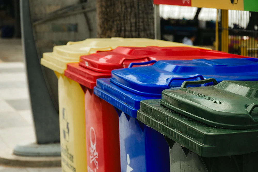 Outdoor public trash can used for garbage disposal and garbage separation for environmental protection and cleanliness concept in vintage tone background